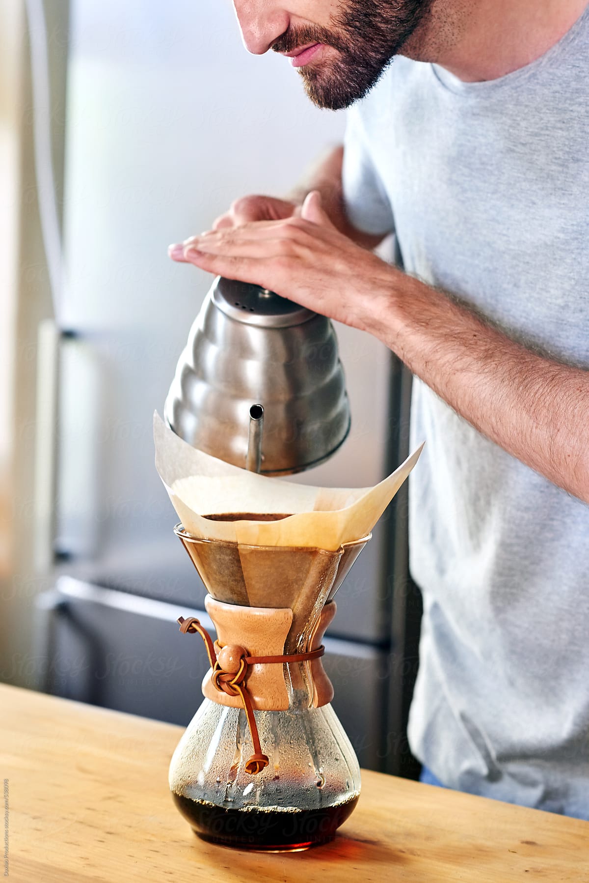 Man preparing morning coffee