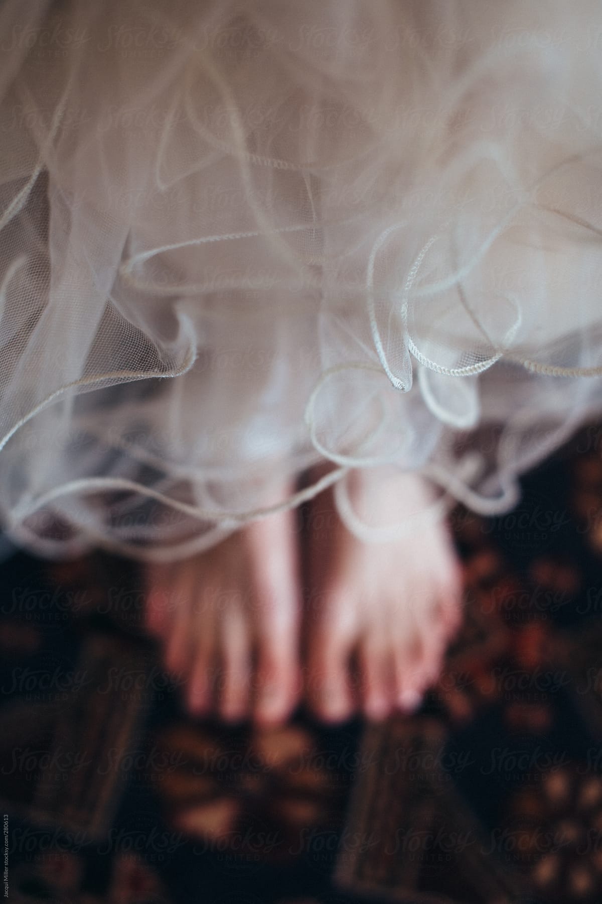 Womans Bare Feet Beneath A Long Tulle Evening Gown By Stocksy Contributor Jacqui Miller 1687