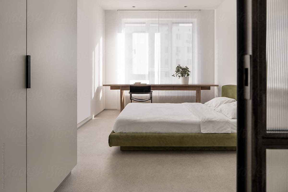 Contemporary interior of bedroom with light walls