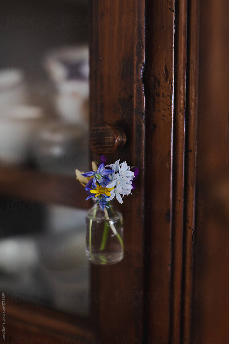Flower bouquet hanging from knob