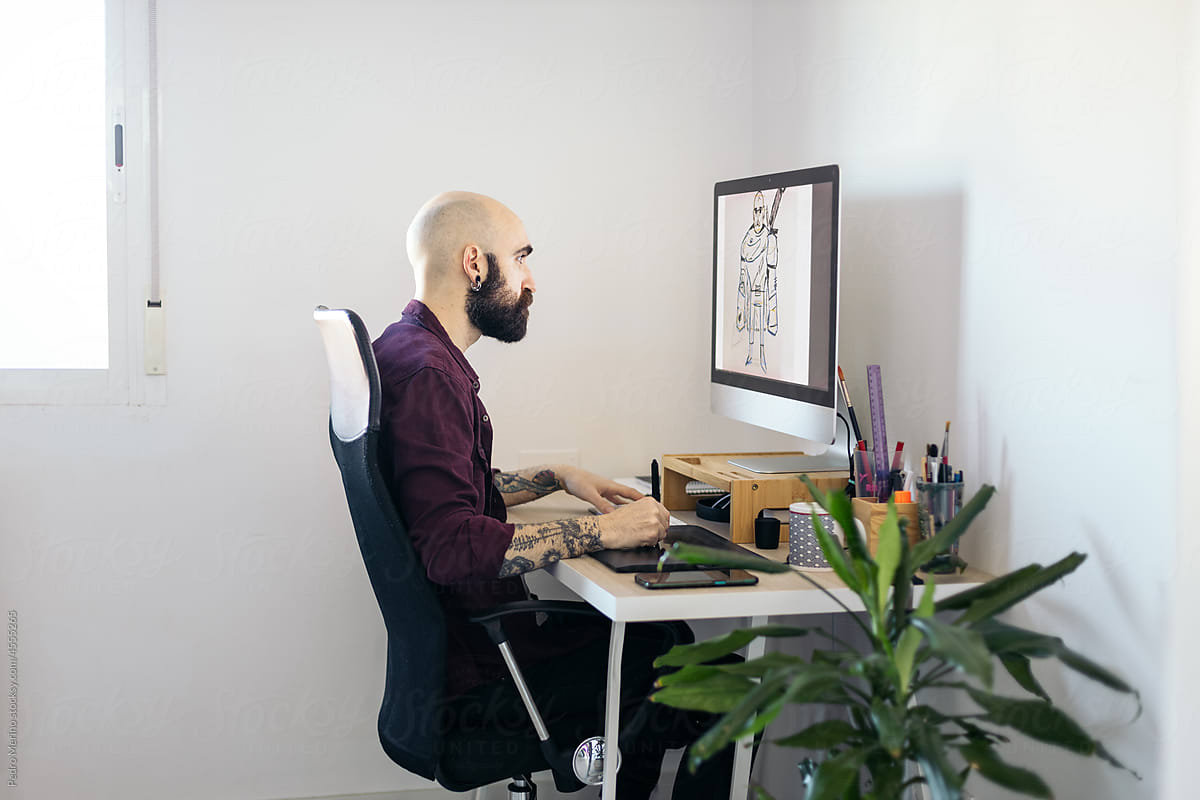 Graphic designer working in his home office