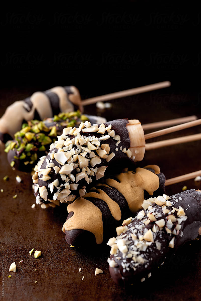 Healthy banana pops with chocolate and nuts