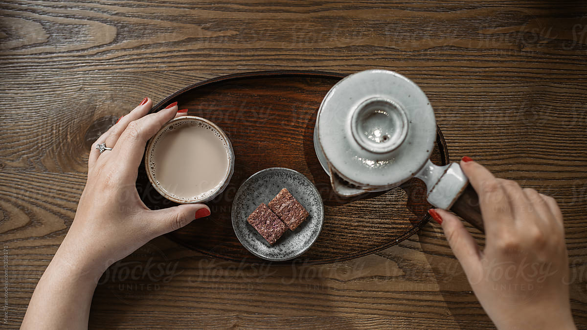 Tea break. Hot milk tea set.