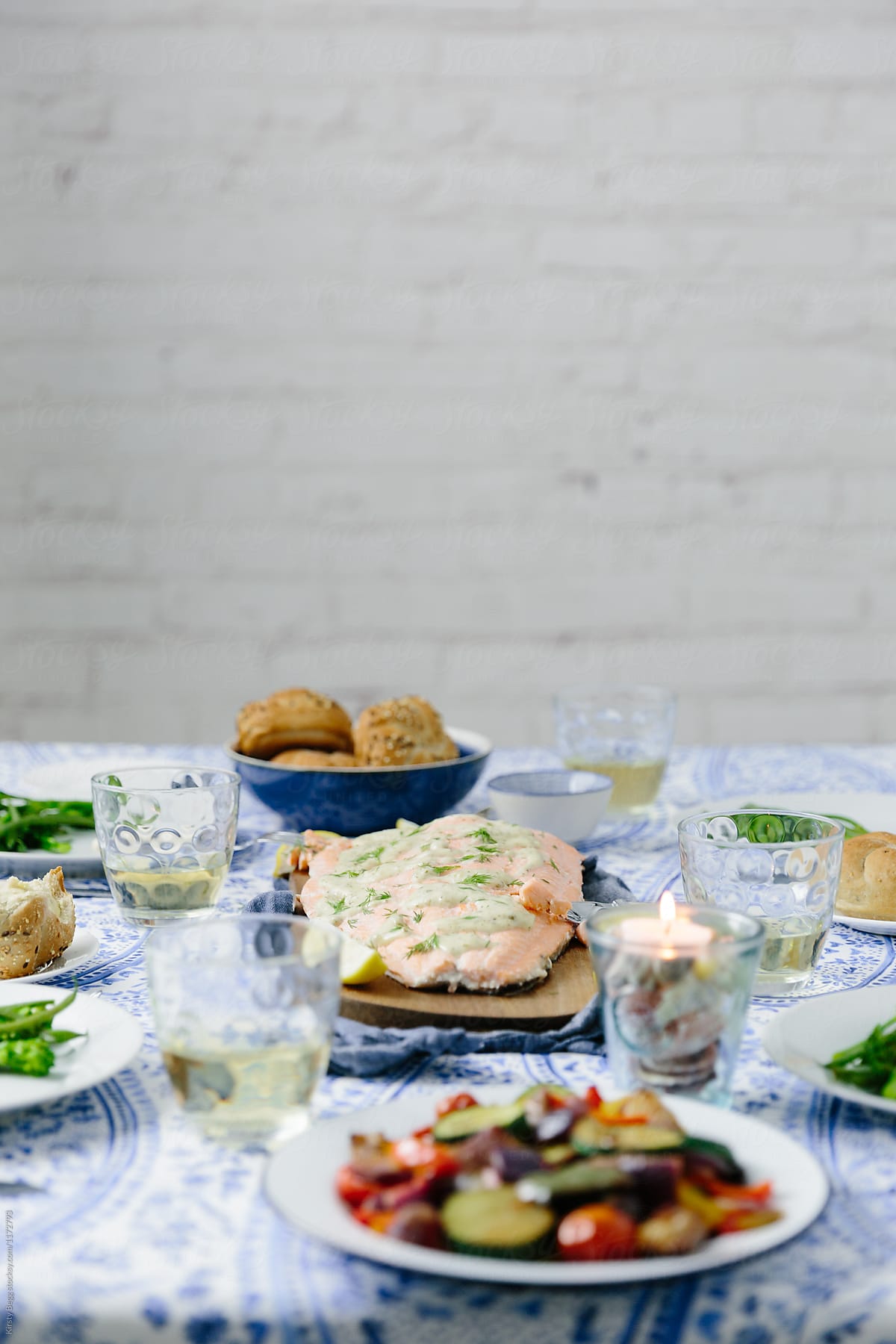 "Dinner Table Set For Salmon Fillet Dinner" by Stocksy Contributor ...