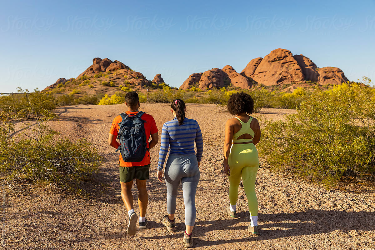 Desert Arid Landscape with Gen z friends Hiking together