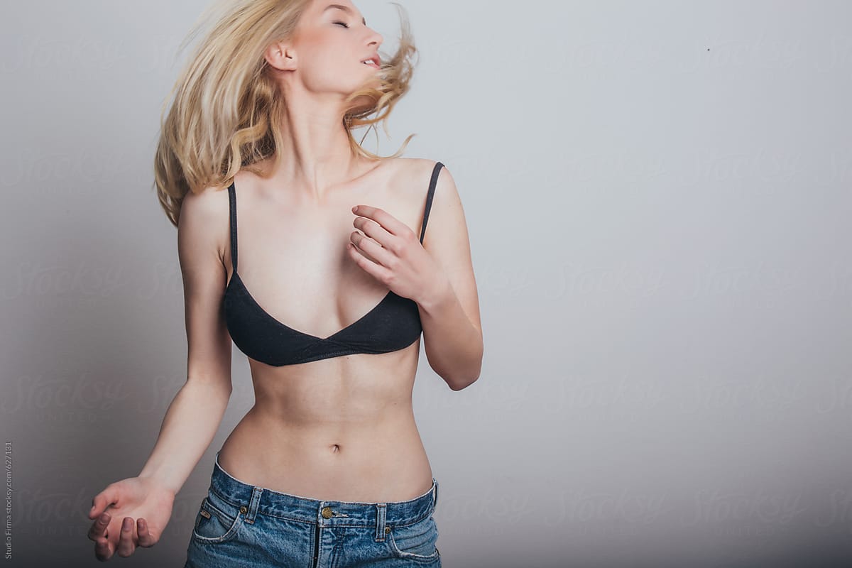 Sexy Blonde Woman In Jeans And Black Bra. by Stocksy Contributor