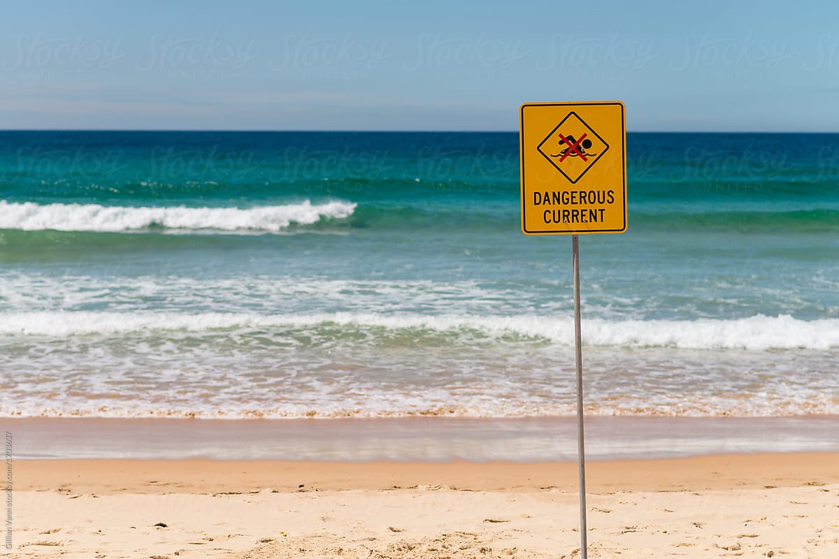 surf sign reading dangerous current