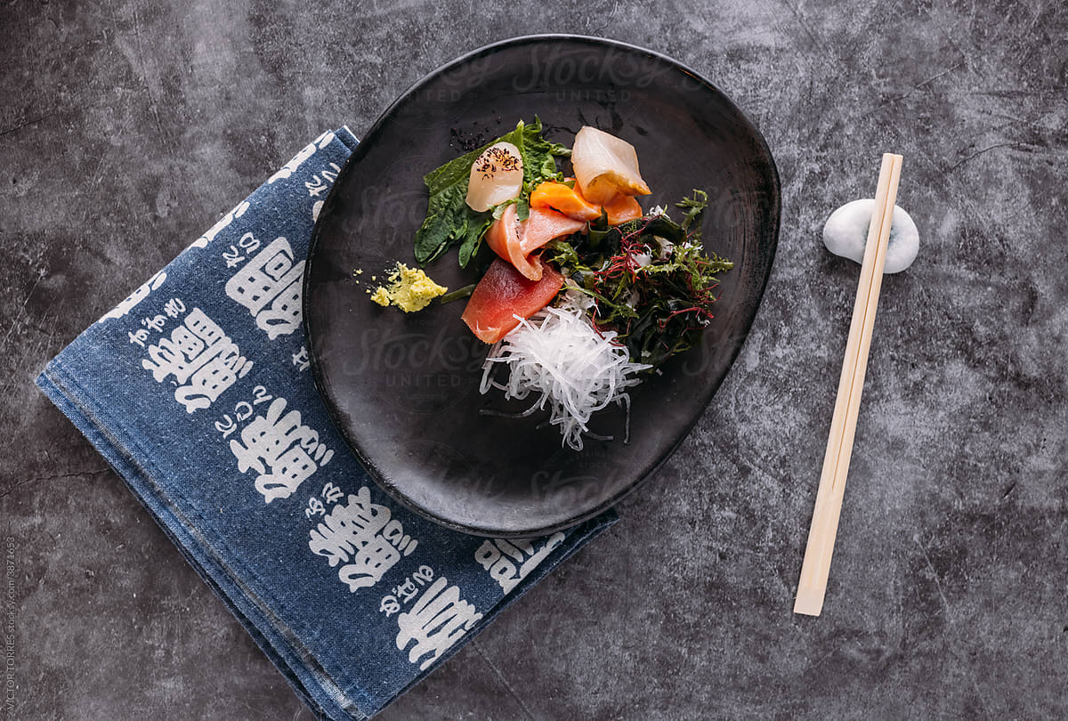 Tasty Sashimi on plate on table