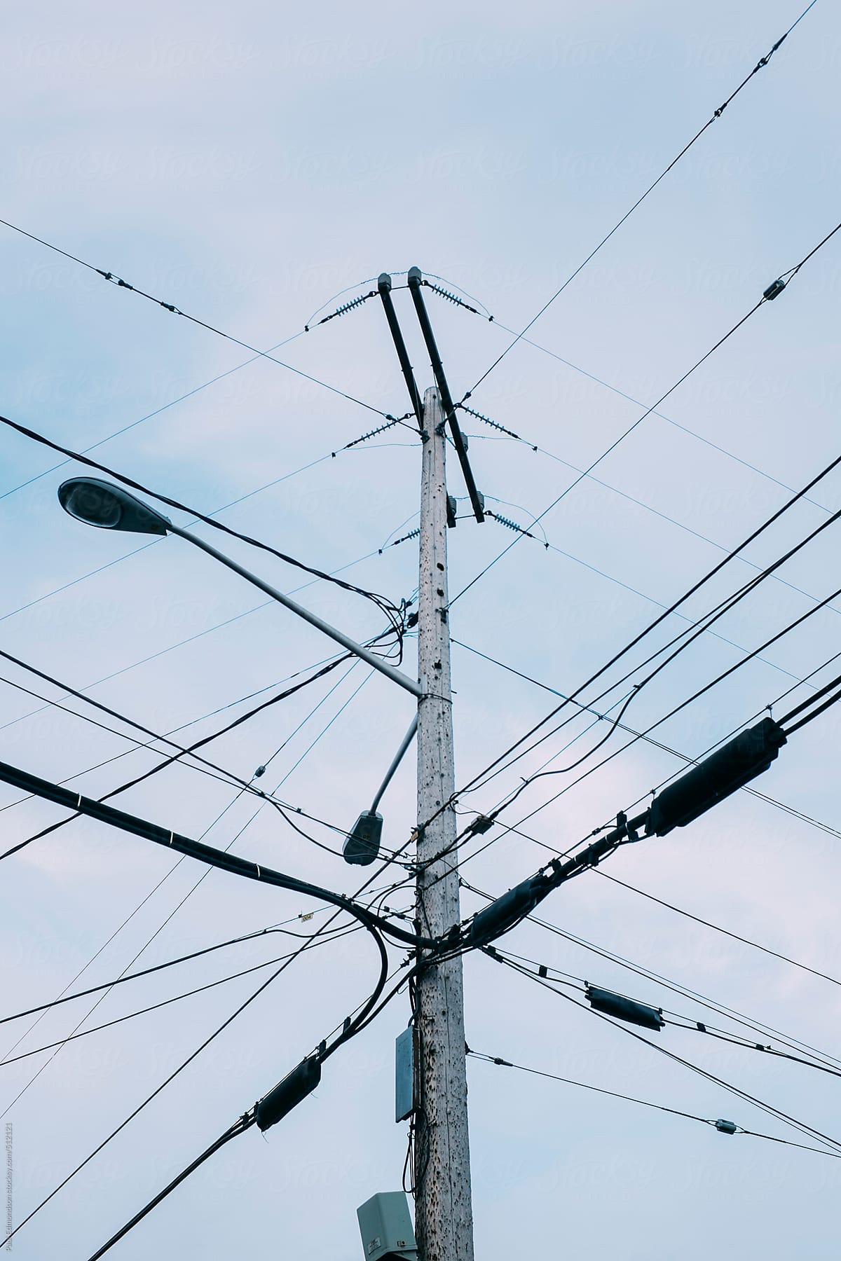Telephone pole, street light and electrical wires