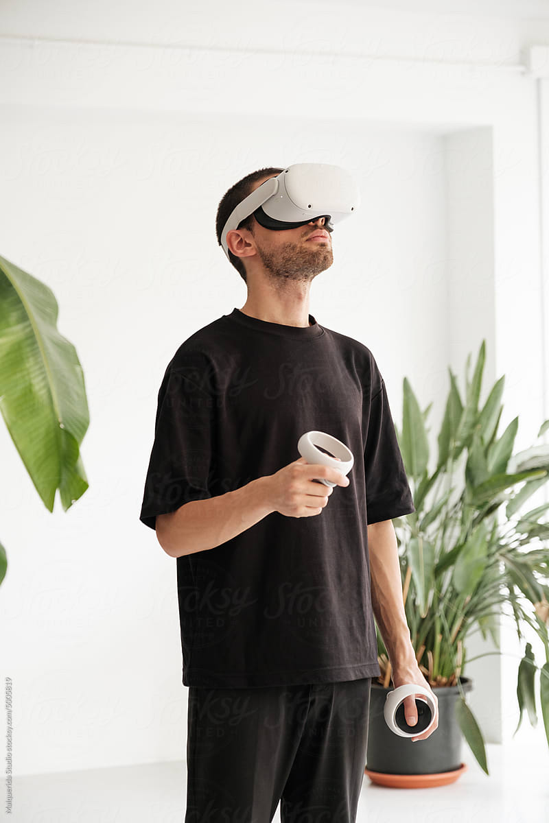 Man In VR Headset Exploring metaverse