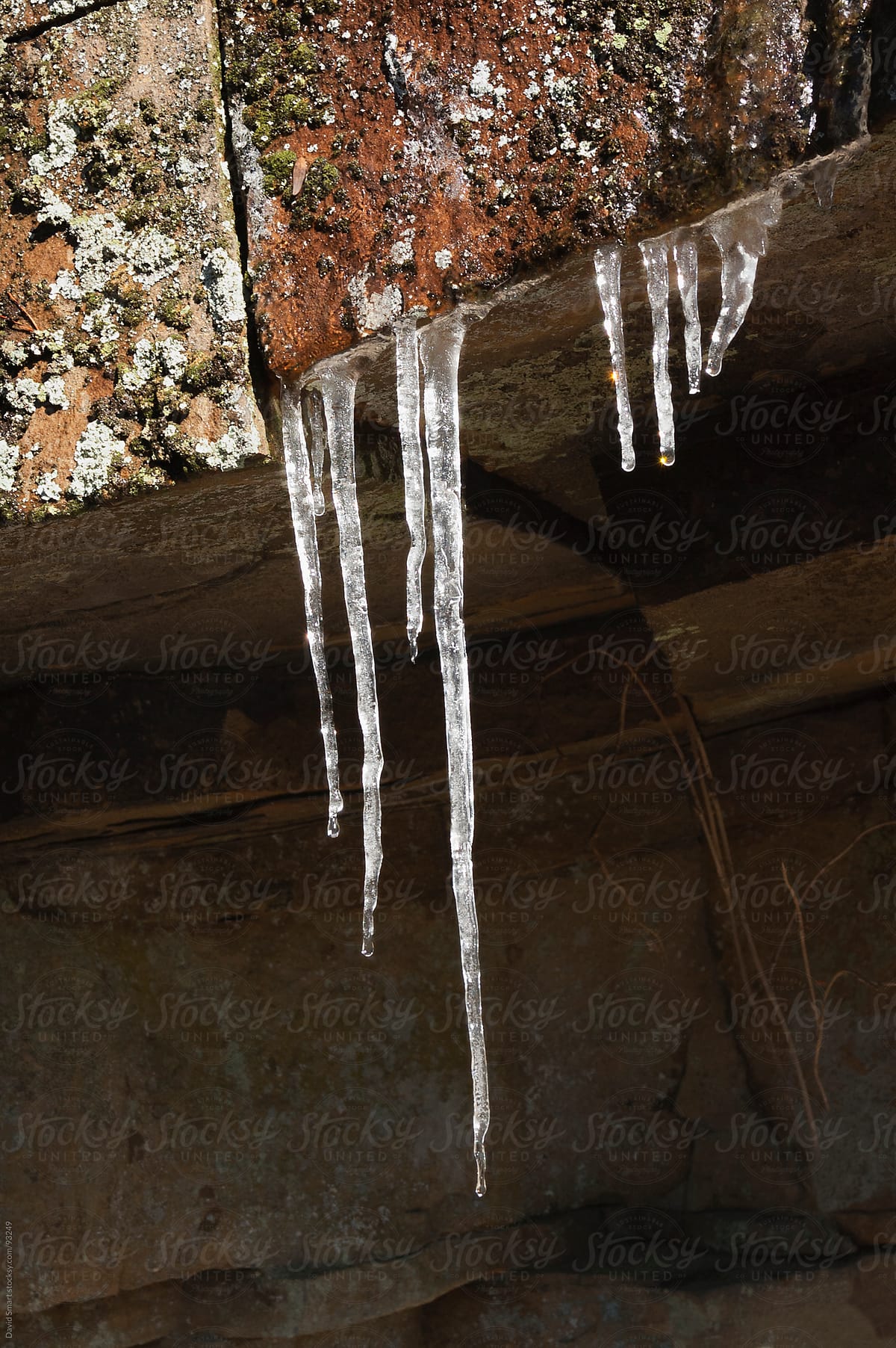Icicles hang from a sandstone bluff