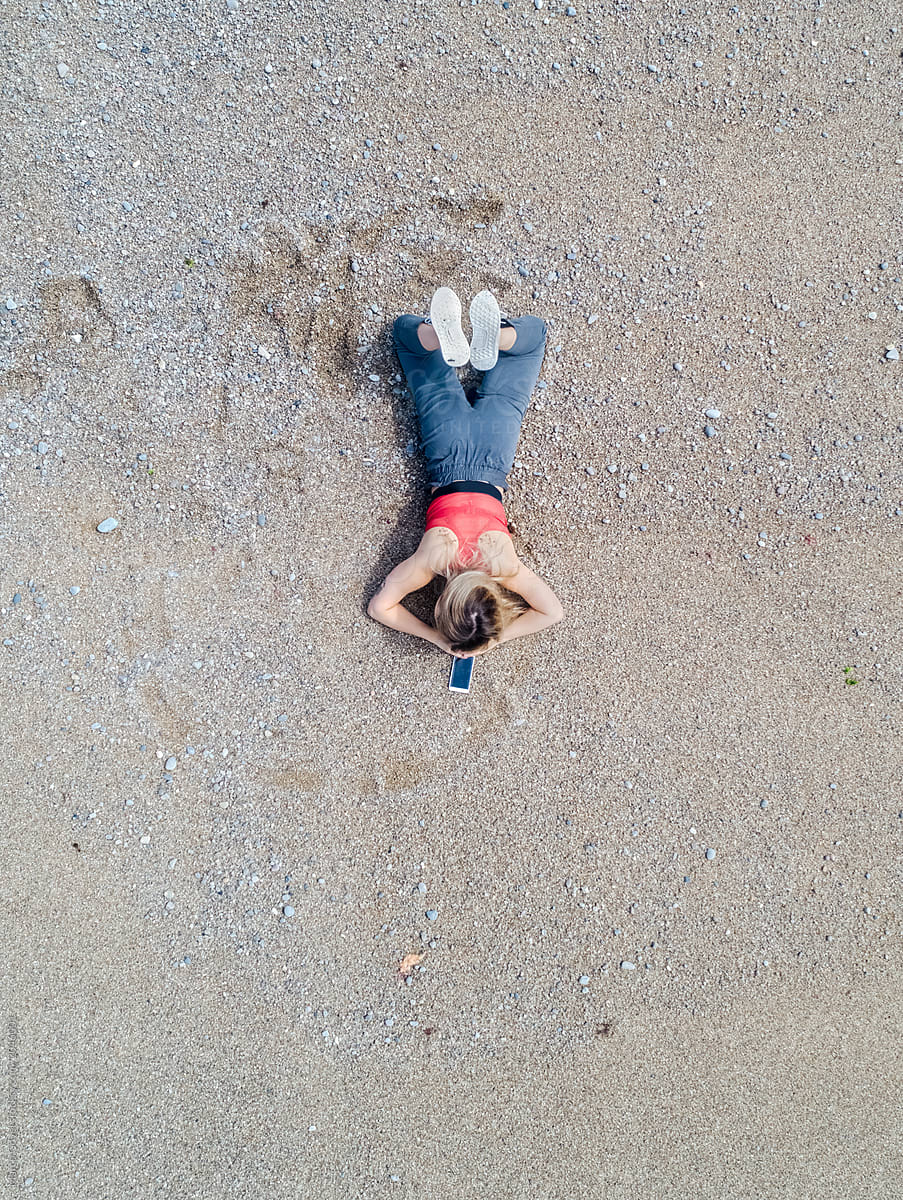 Woman Lying On A Beach By Stocksy Contributor Marco Govel Stocksy 