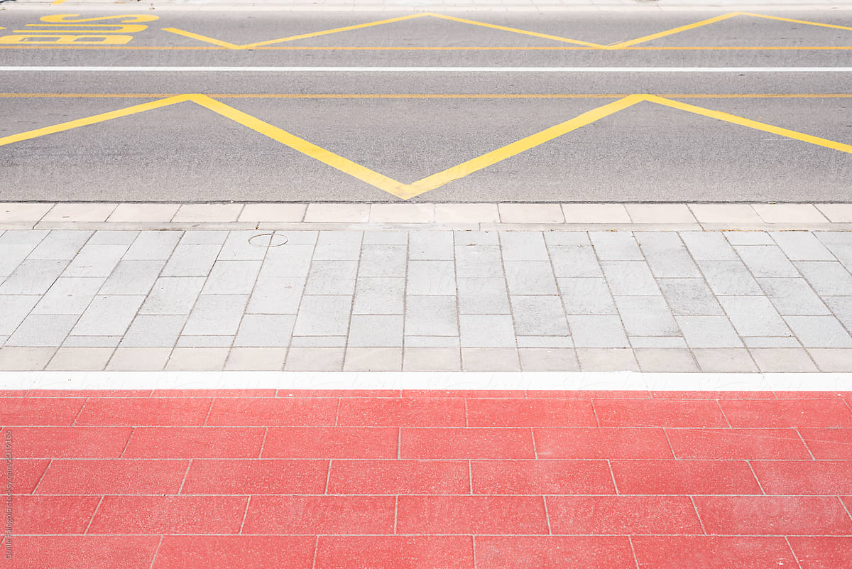 Red and white pavement surface