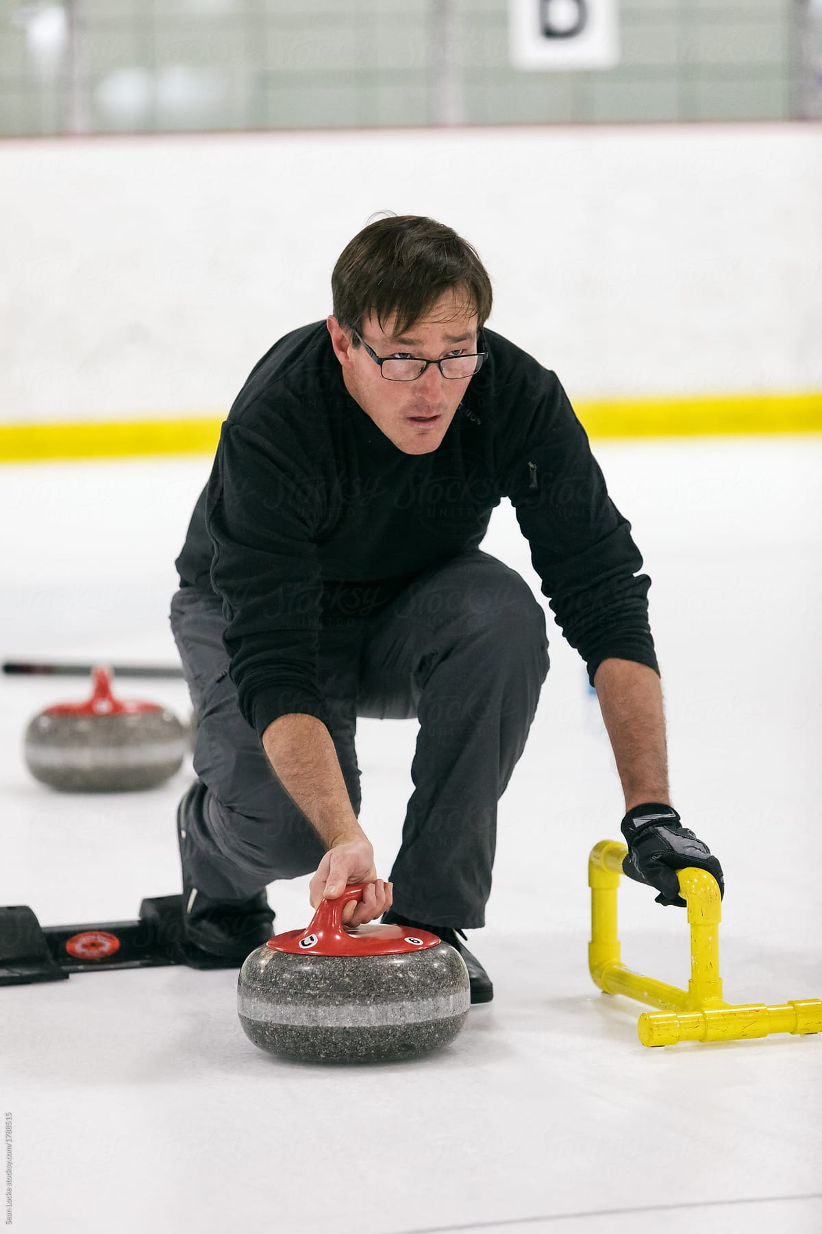 Curling: Male Player Pushing Off From Hack