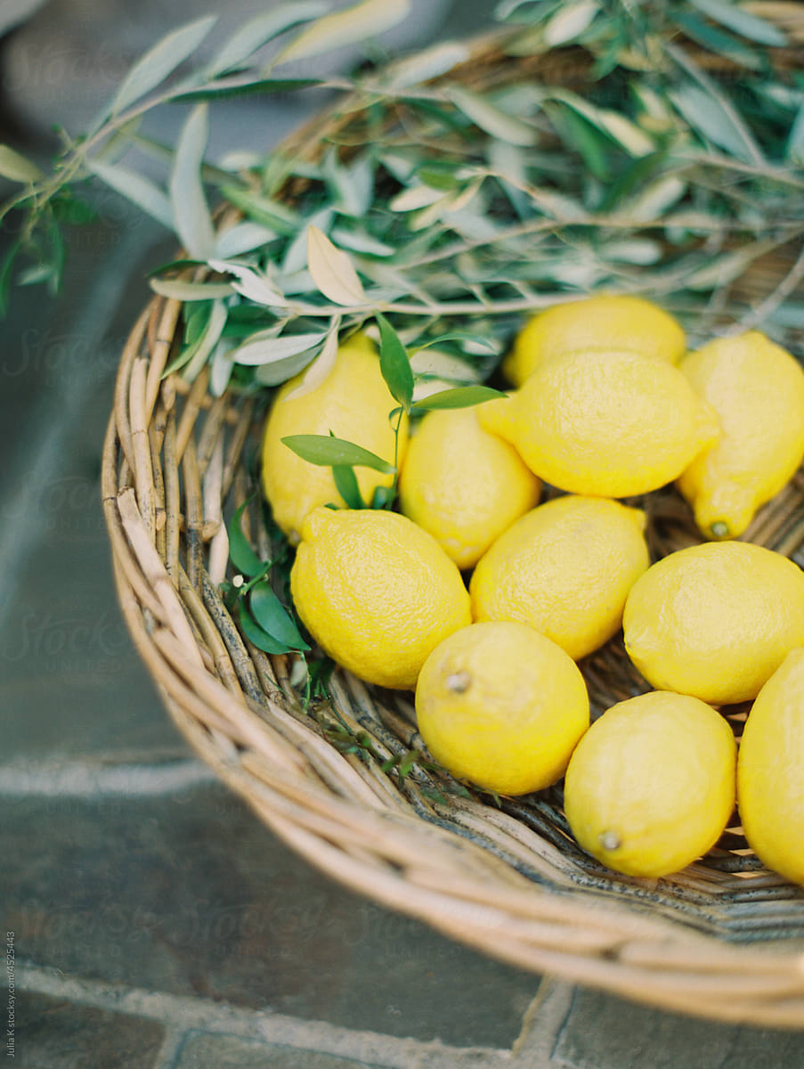 Wicker Basket With Yellow Lemons
