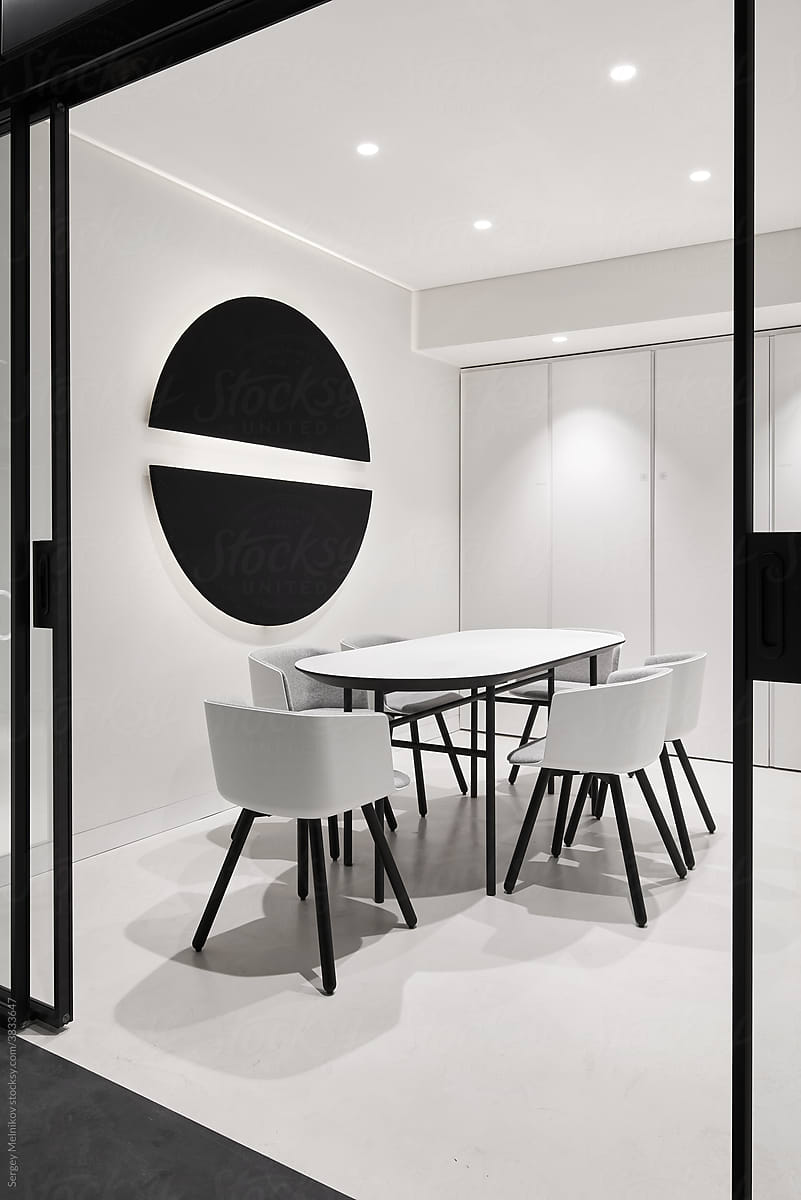 Table with chairs in minimalist style room