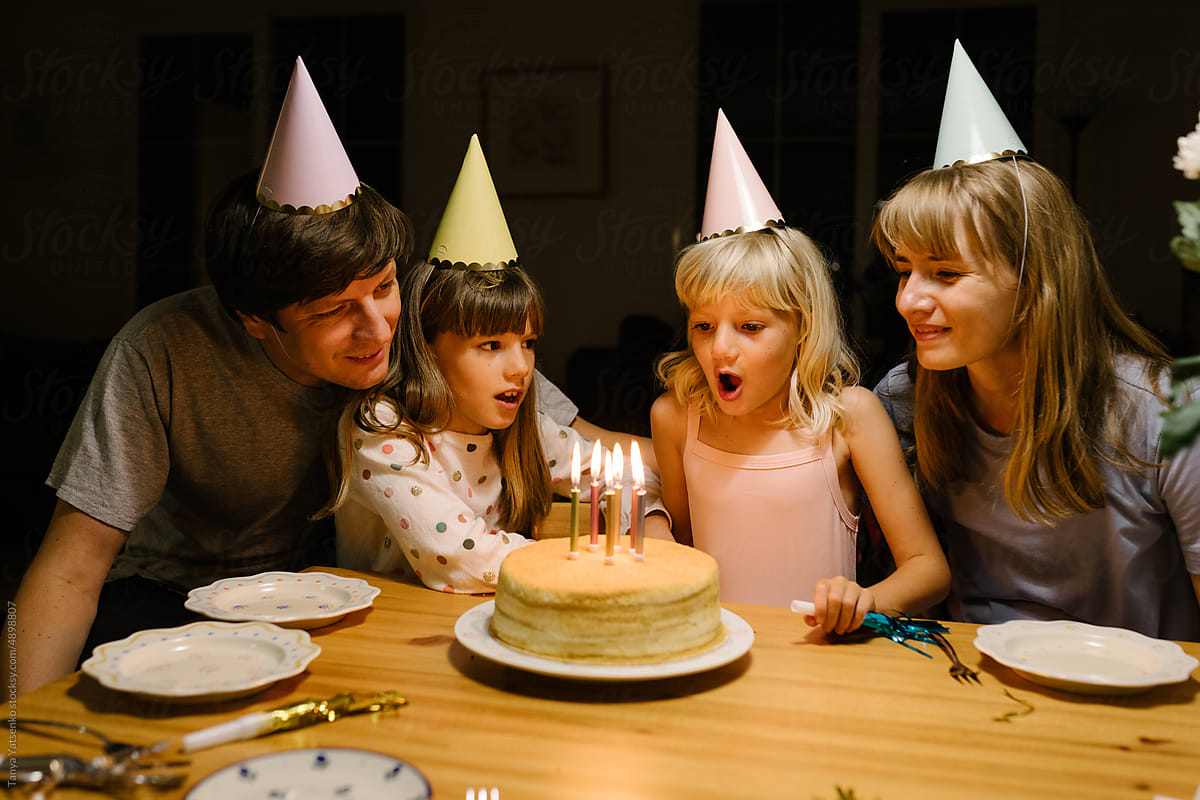 Family celebrating birthday of a daughter