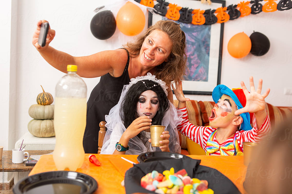 Mum takes selfie with her kids at halloween party