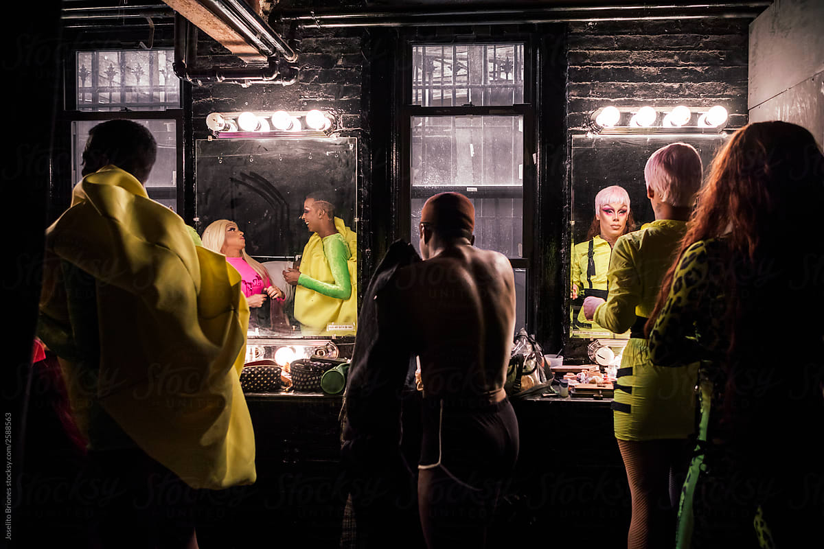 Group of Drag Queens Backstage with Costume and Make-up in front of Mirror