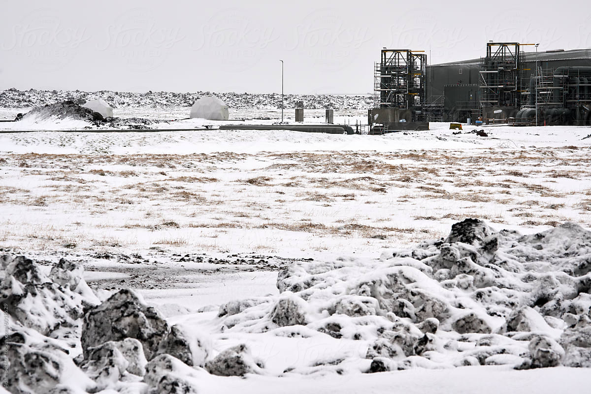 Carbon capture and storage - dirty snow near construction