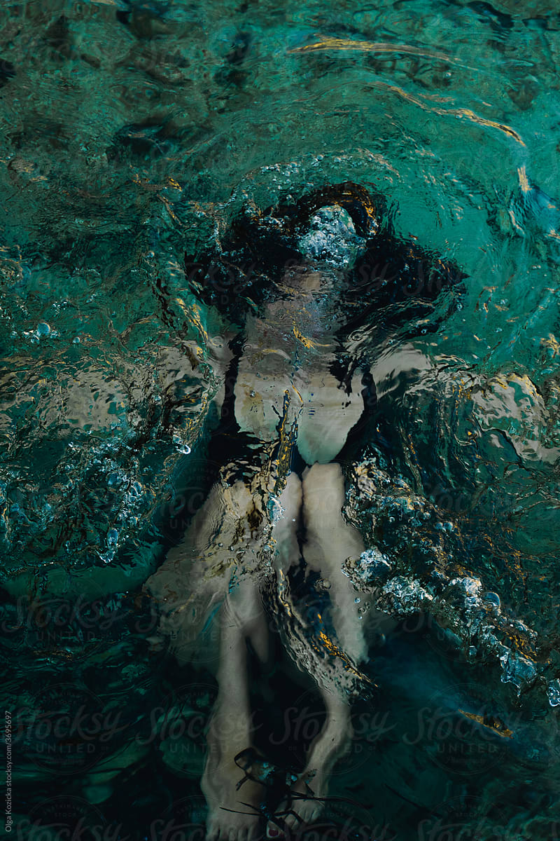 Woman Diving Underwater