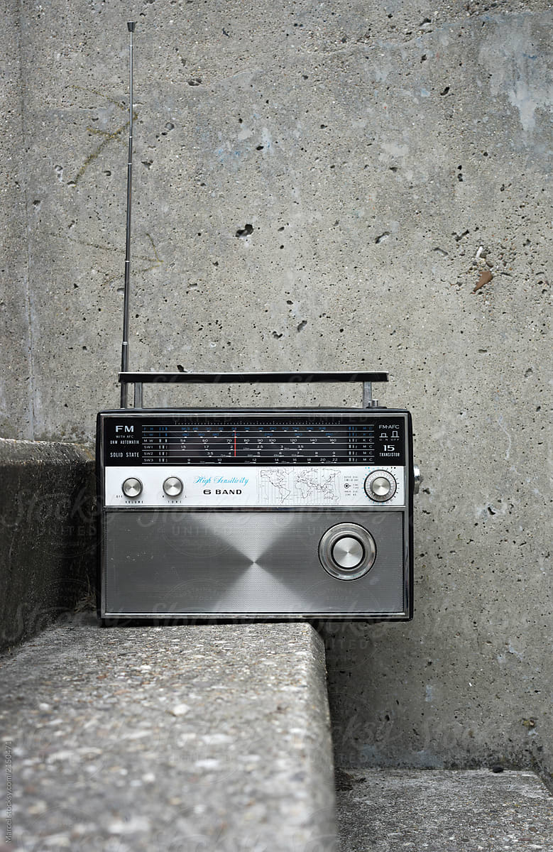Vintage radio on concrete stairs