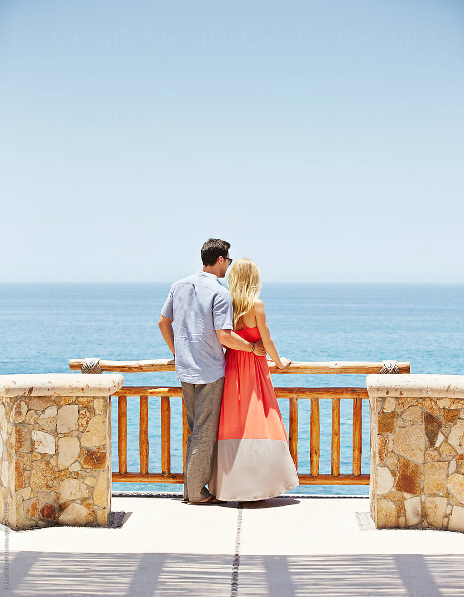Young couple looking at the ocean view