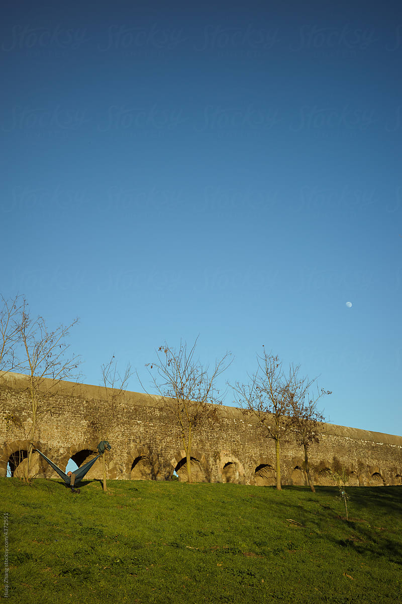 By the ancient Roman aqueduct at sunset and moonrise