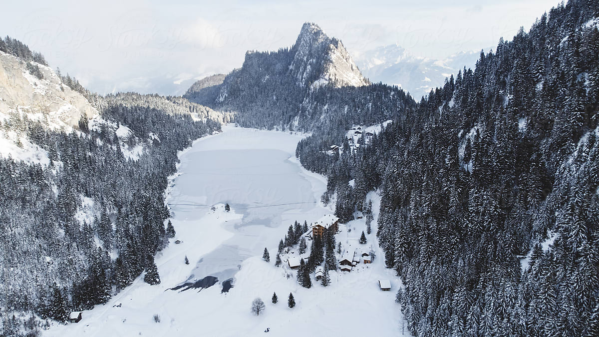 Bird\'s eye view of frozen Lac de Taney in Swiss Alps