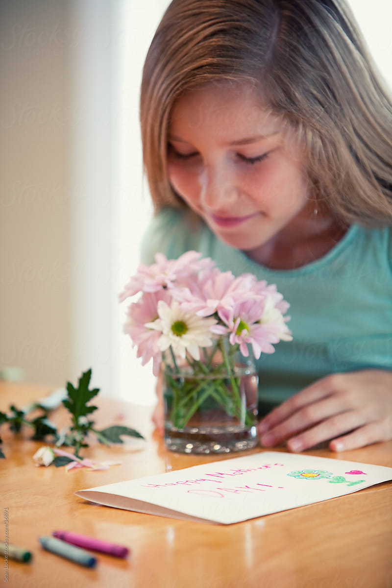 Mother\'s Day: Girl Makes Flower Arrangement for Mom