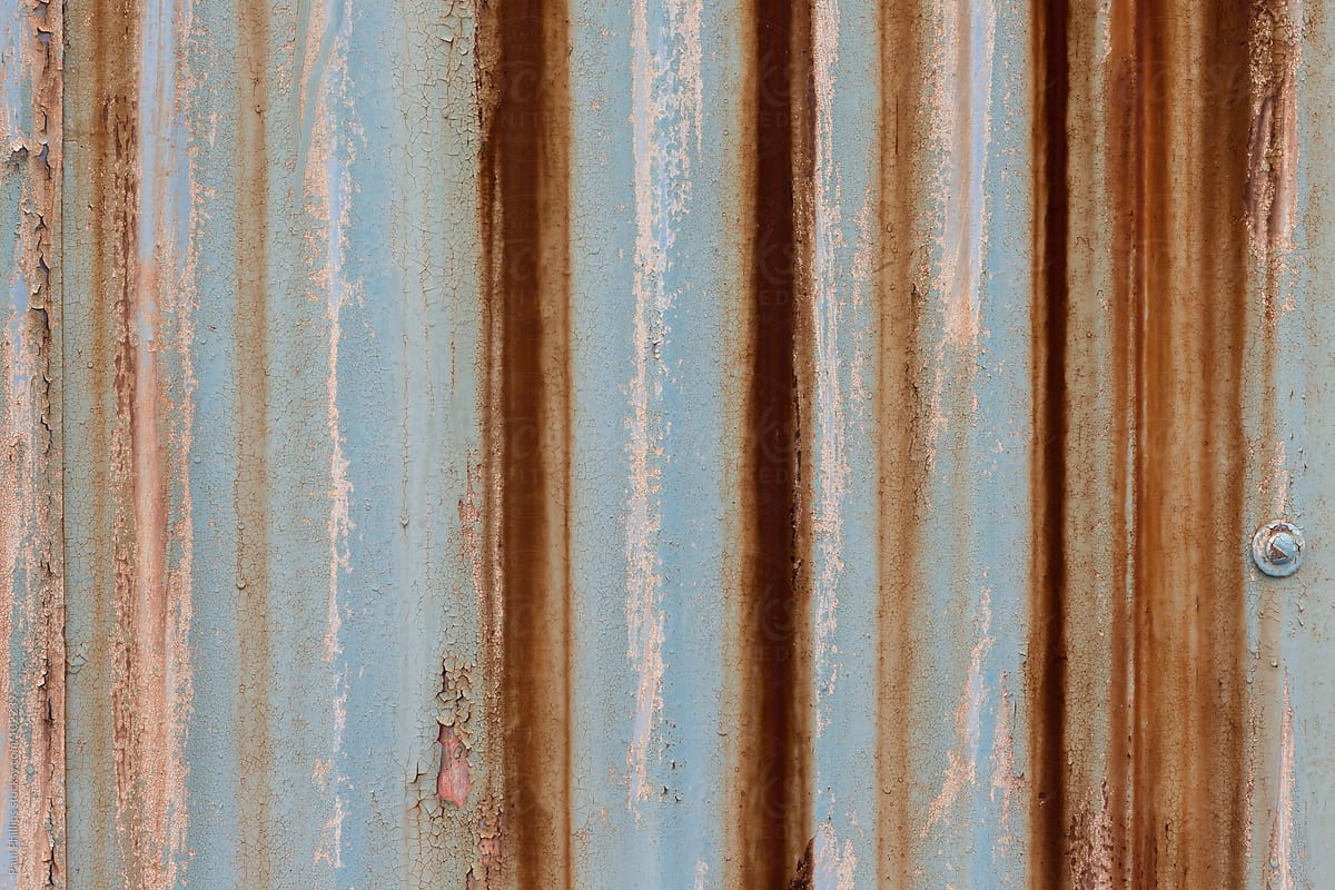 Flaking And Rusty Corrugated Metal Sheets Attached To A Building by  Stocksy Contributor Paul Phillips - Stocksy