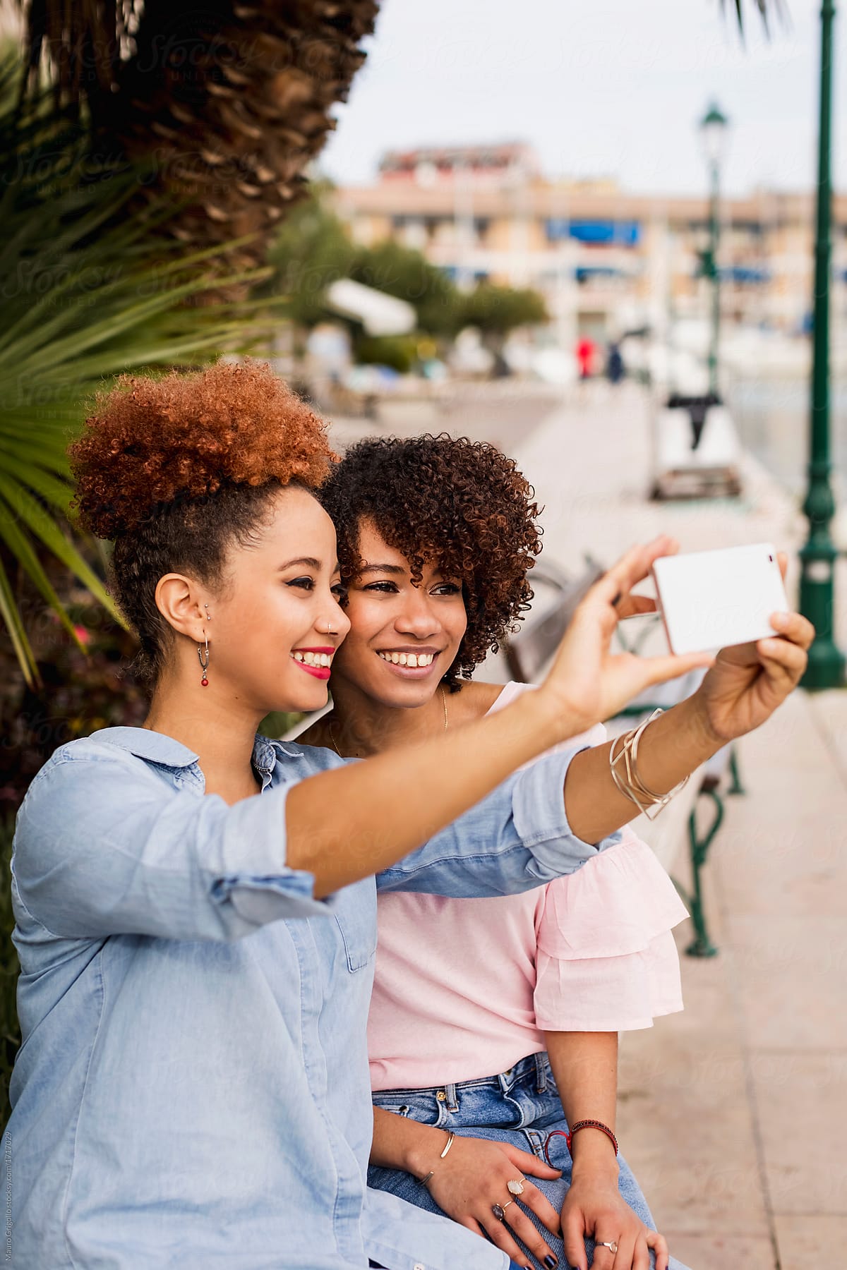 Afro women using a mobile phone for a selfie