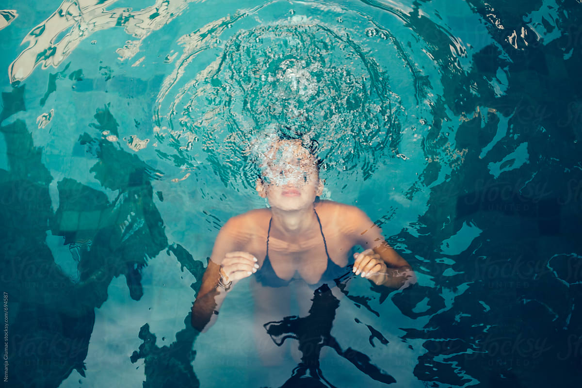 Tanned Caucasian Woman Underwater By Stocksy Contributor Nemanja