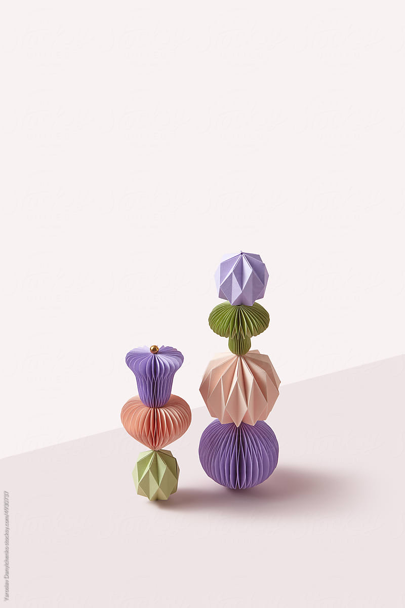 Pastel colored folded paper baubles.