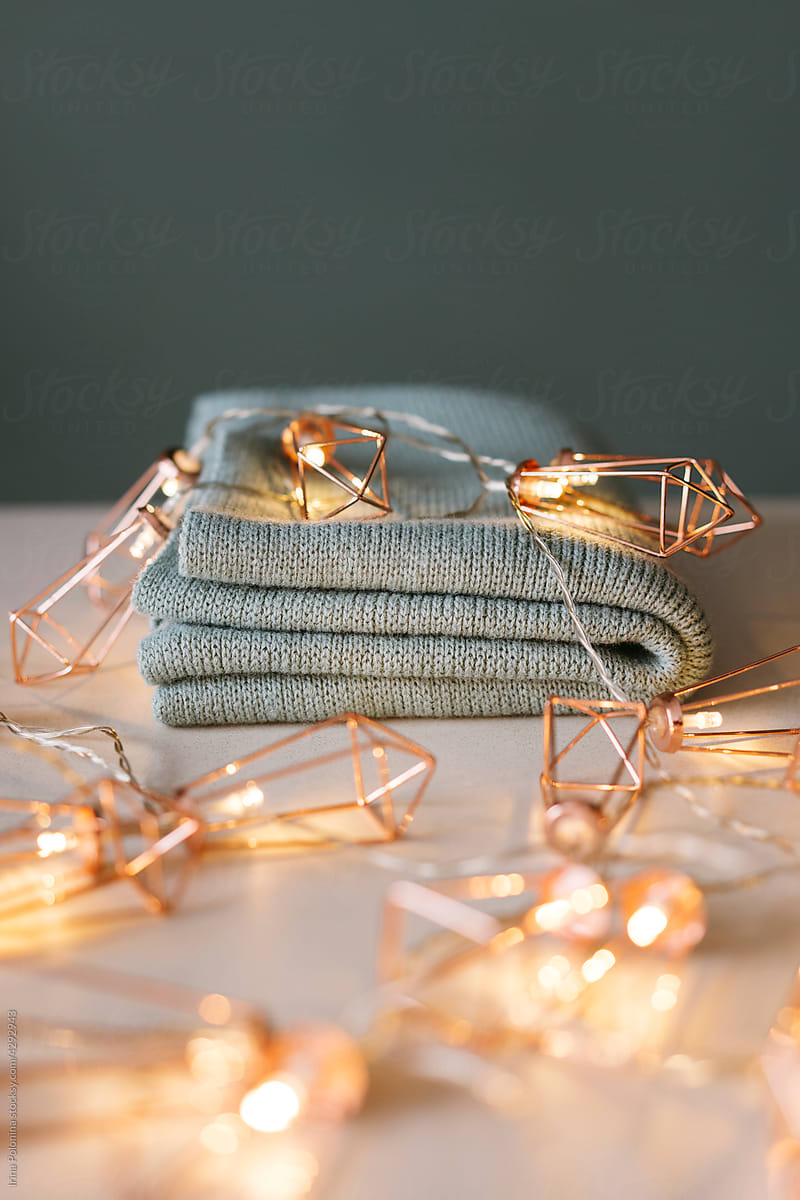 Wool scarf with fairy lights garland.