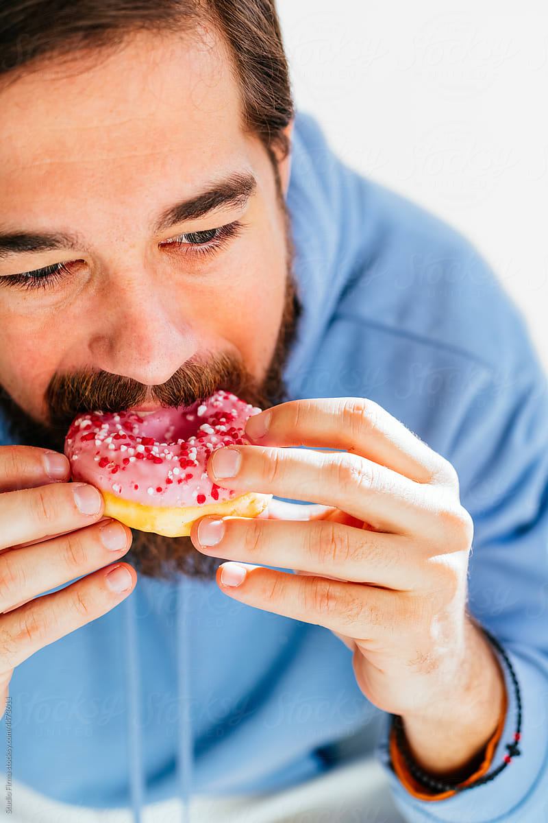 Man Eating Donut