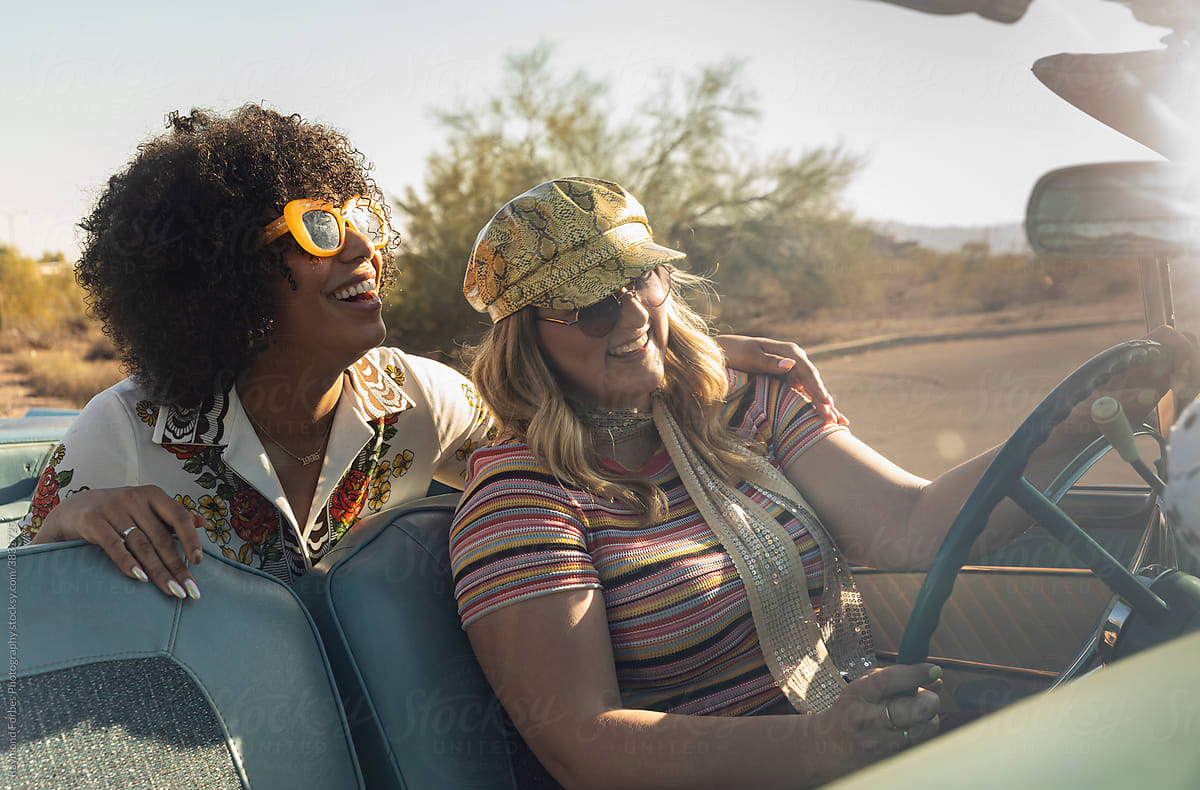 Two young friends Laughing  on Road Trip in American West