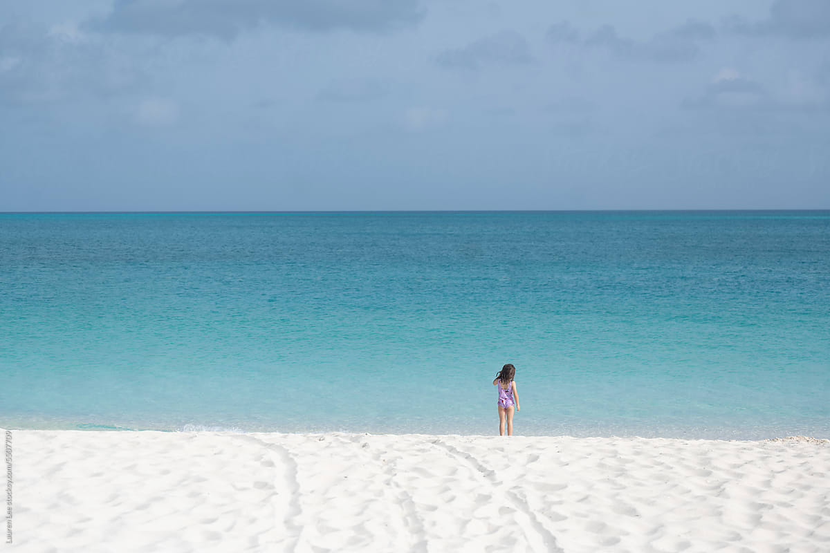 Child on beach in Turks and Caicos