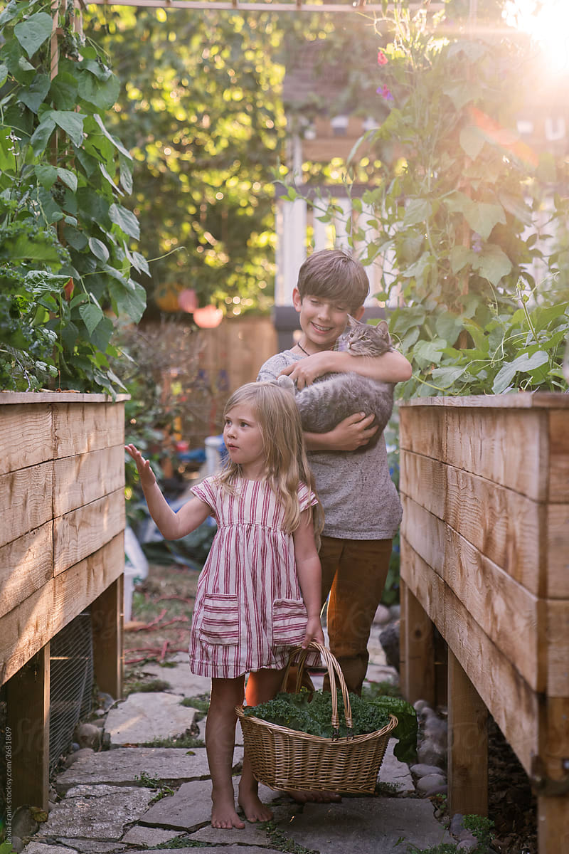two young children in urban farm