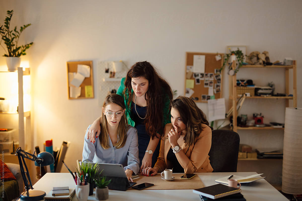 Three women working in a home office