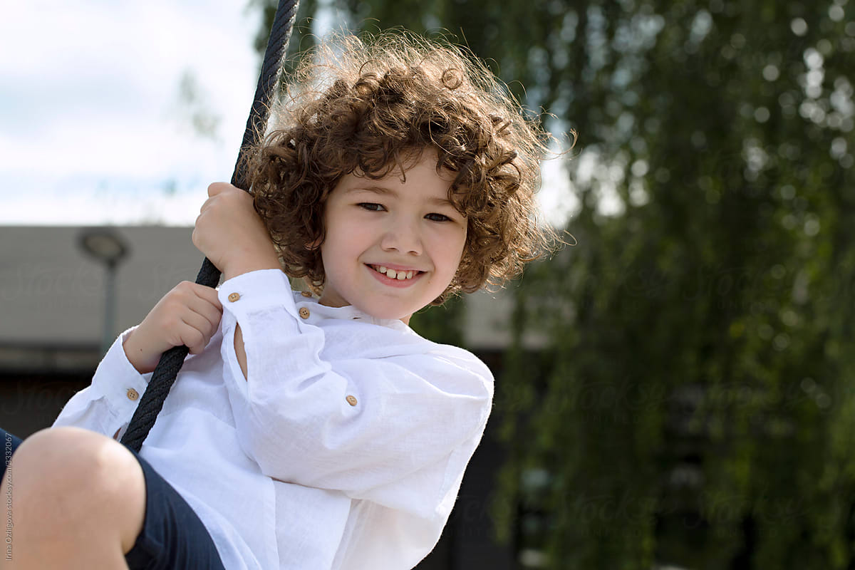 cute toddler boy with curly hair
