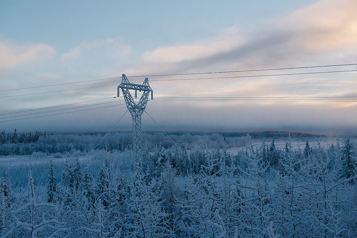 power line covered in frost on a cold winter day in Alaska