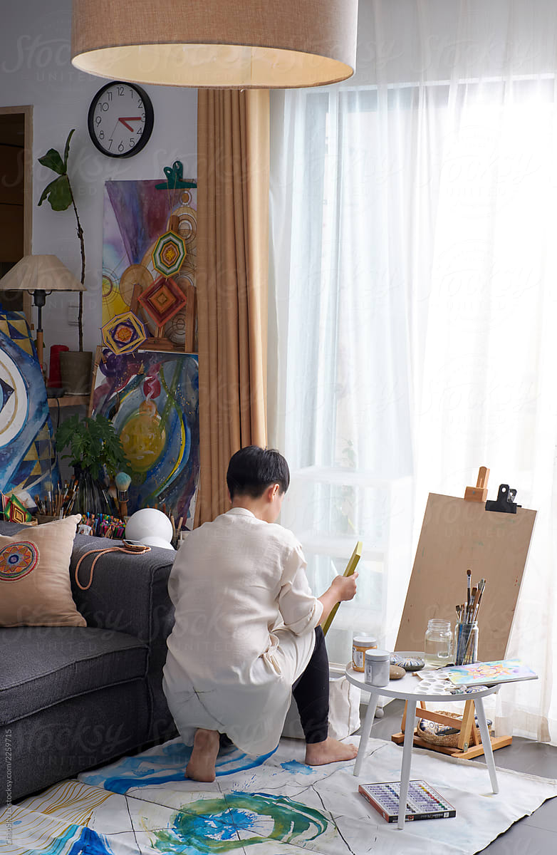 Asian woman painter, art painter. Work at home
