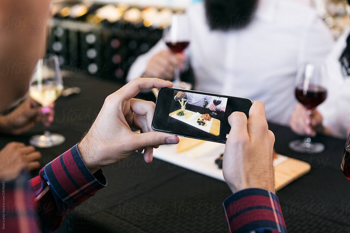 Wine: Man Takes Photo Of Cheese Tasting Board