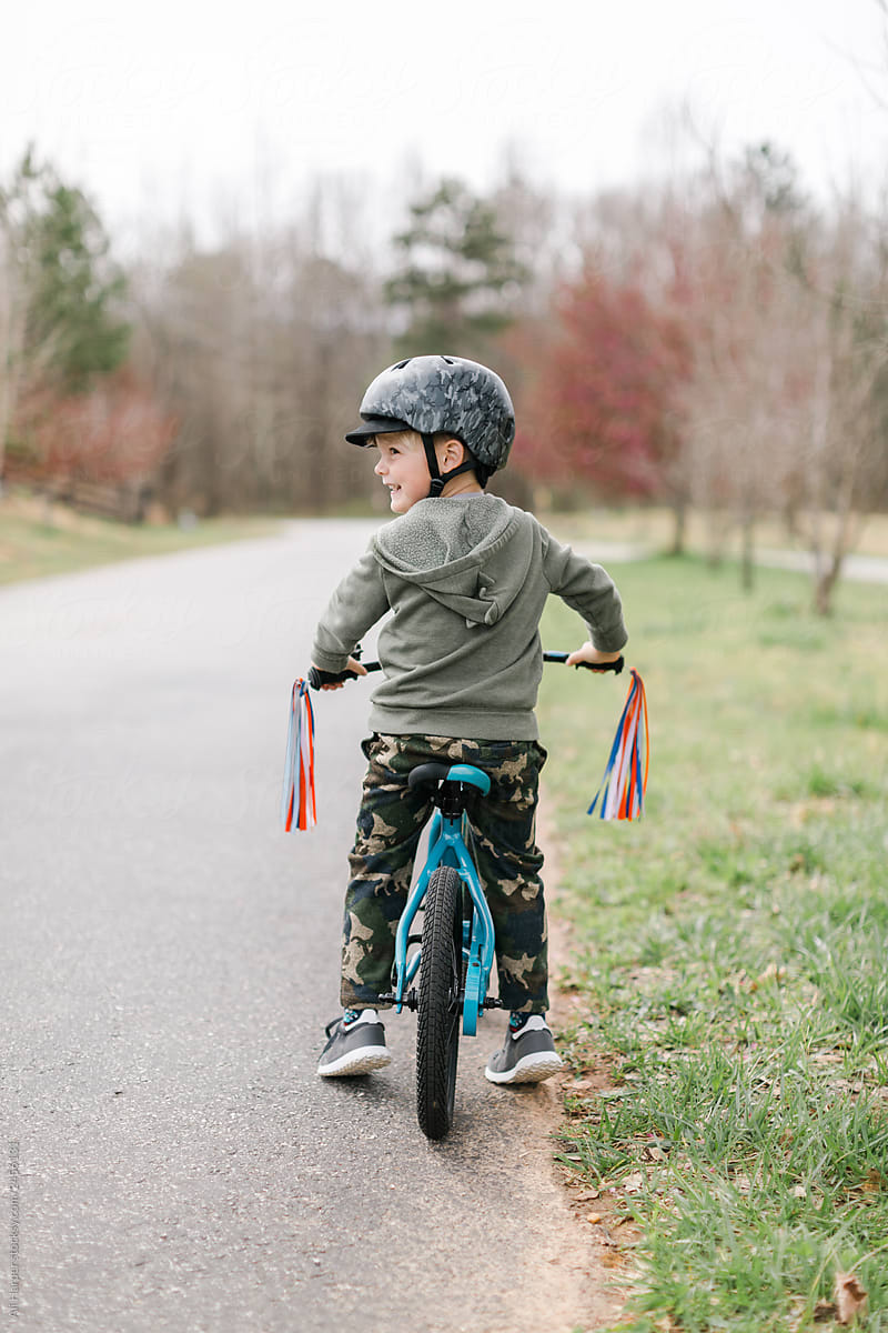 Boy excited to learn how to ride bike