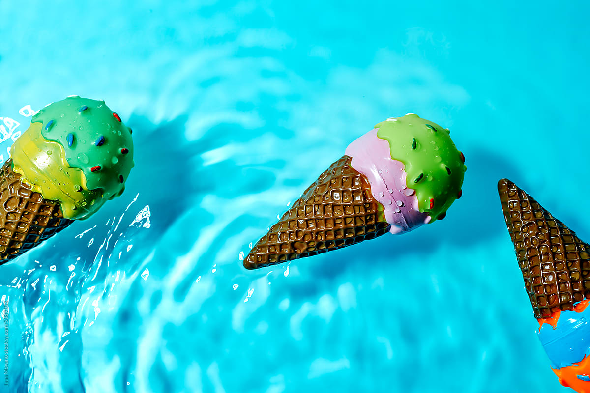 plastic ice cream cones on the water