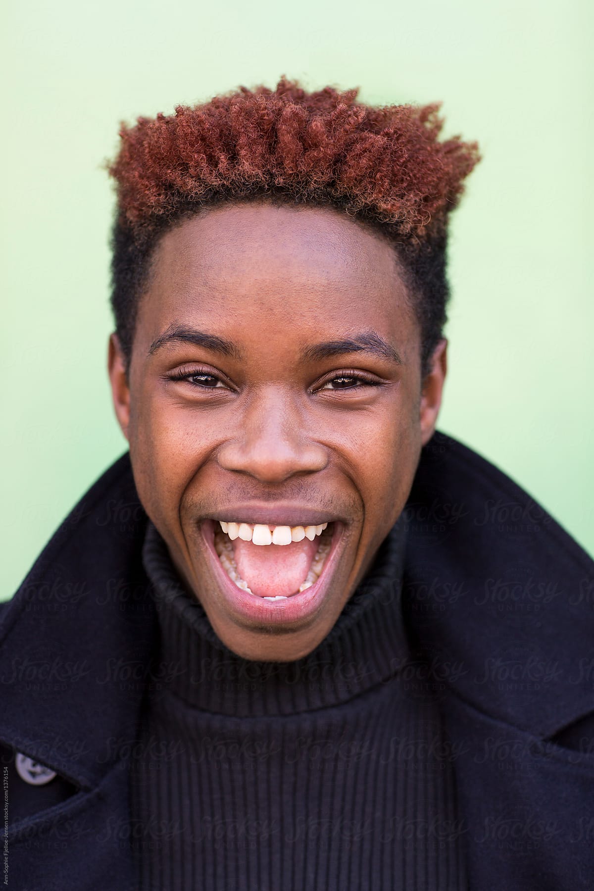 Young black man smiling.