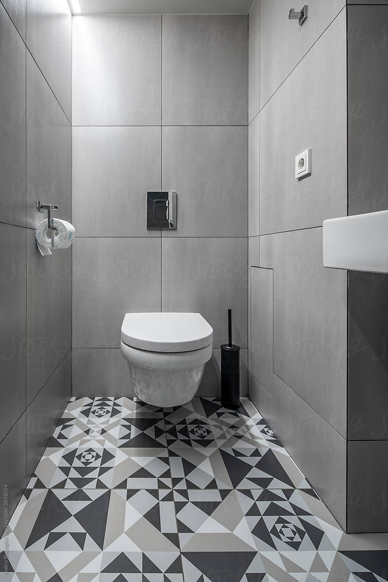 Illuminated interior in modern style with tiled walls