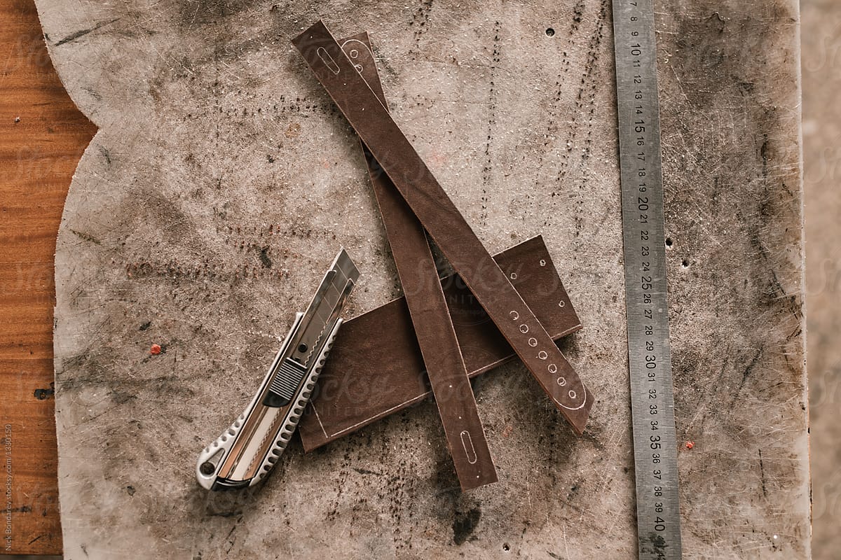 Close-up of instruments at manufacture of craft leather products