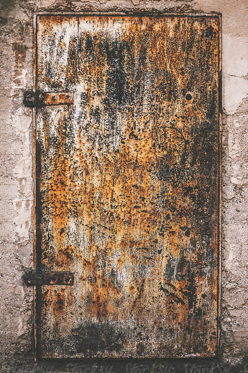 Old rusty metal door.